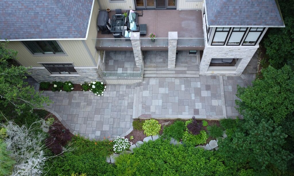 Full Outdoor Renovation with Natural Stone in Backyard, Driveway and Front Entrance