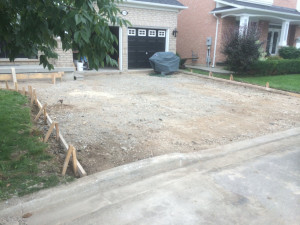 Wooden perimeter constructed for driveway